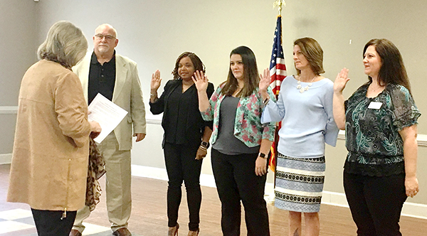 swear in